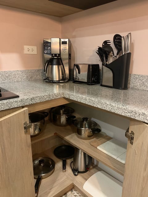 Microwave, coffee/tea maker, cookware/dishes/utensils