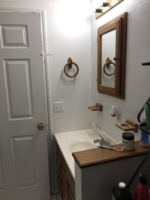Bathroom with shower and tub and towels provided for your stay
