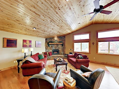 Comfy great room / sitting area with couch, love seat, and two armchairs