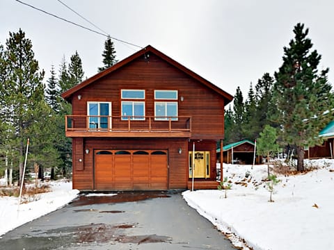 Flat driveway with large two car garage and driveway parking