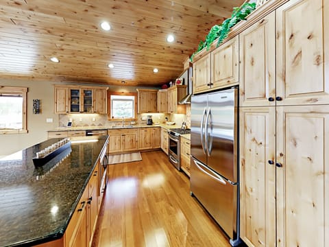 Microwave and wine refrigerator in large island