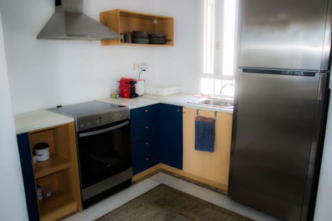 Kitchen with full appliances and equipment
