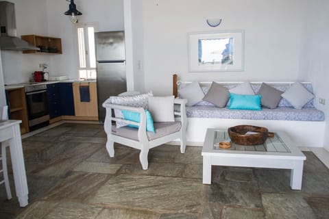 Living room and kitchen at the upper level of the house