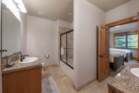 Combined shower/tub, hair dryer, towels, soap