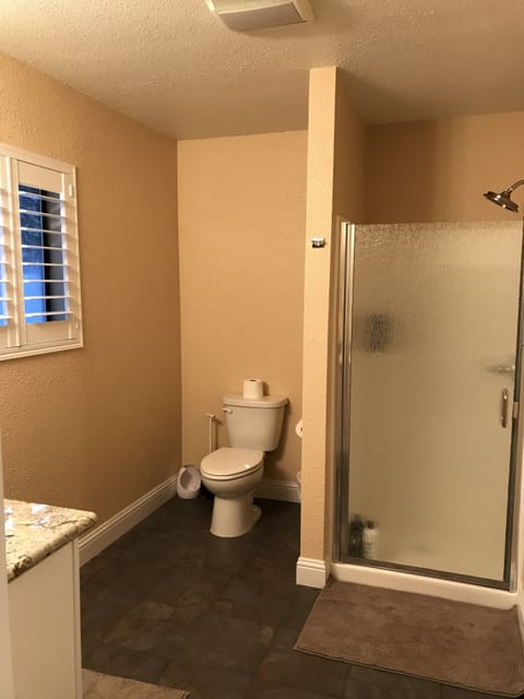 Combined shower/tub, hair dryer, towels, soap