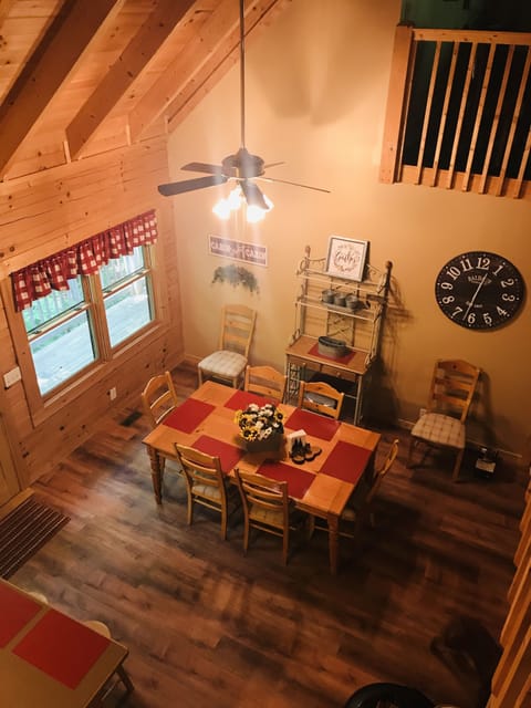 Lovely dining room open to the family room that seats eight.