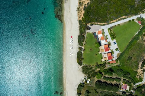 On the beach, sun loungers, beach towels