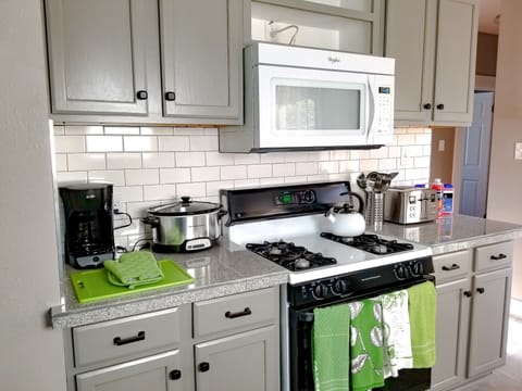 Kitchen with microwave, coffee maker, toaster, crook pot and much more