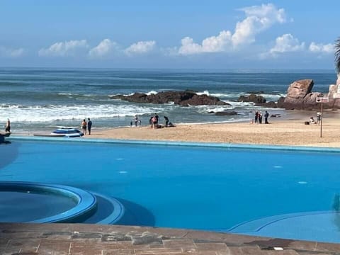 On the beach, sun loungers, beach towels