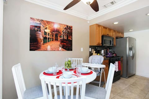 A view of the dining and kitchen area.