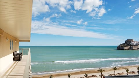 On the beach, sun loungers, beach towels