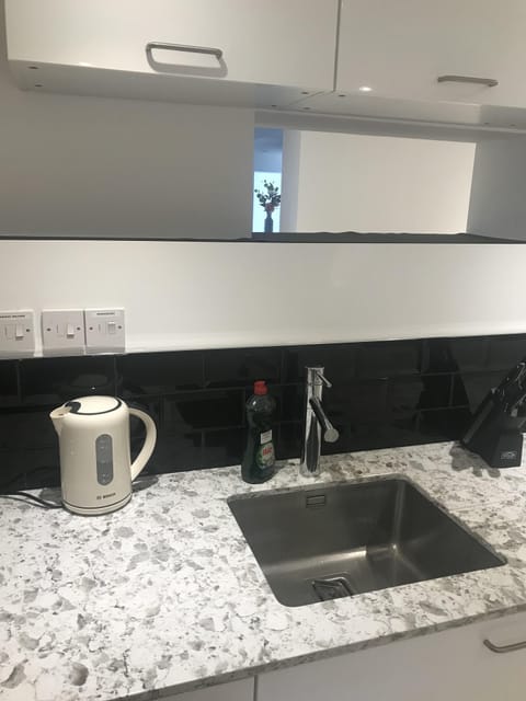 contemporary kitchen with marble worktop