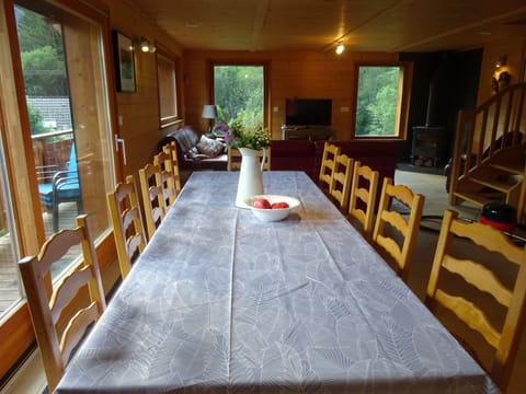 dining table seats 12 people, sliding doors to balcony