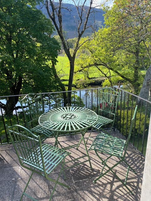 While away the day far from the madding crowd .. Patio overlooking the river