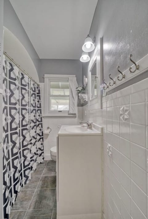 Main level bathroom with tub and shower combo