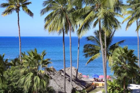 On the beach, sun loungers, beach towels