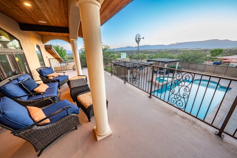 Upstairs Deck With A Relaxing View Of The Pool And Mountains