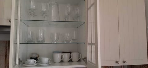 Fridge, stovetop, coffee/tea maker, electric kettle