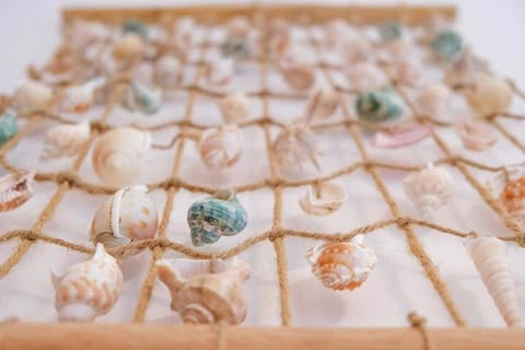 A close-up of a decorative item, possibly a tray with small figurines or trinkets. The detail adds a personal touch to the decor.