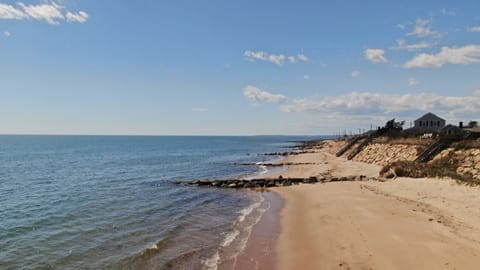 On the beach, sun loungers, beach towels