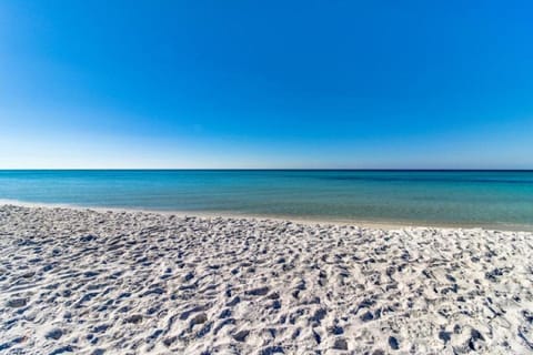 On the beach, sun loungers, beach towels