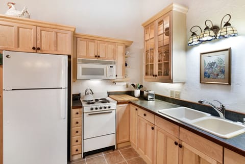 Well equipped kitchen stocked from a owner who likes to cook.