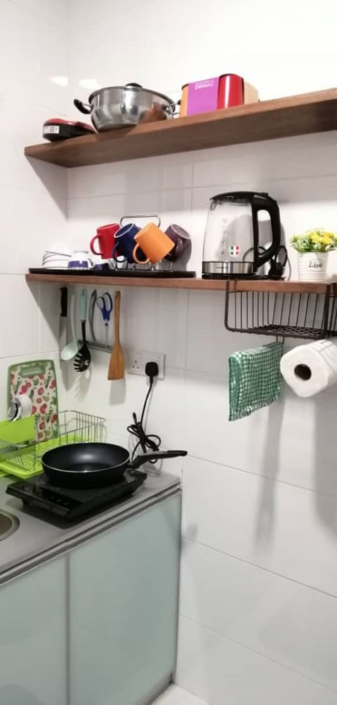 Fridge, microwave, electric kettle, cookware/dishes/utensils