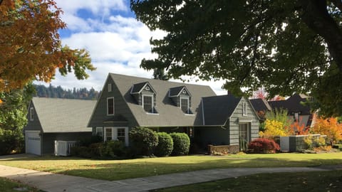 On large corner lot with private, well-fenced back yard