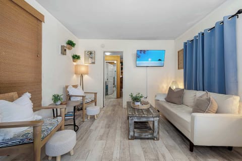 Living area includes a 42 inch Roku TV and board games