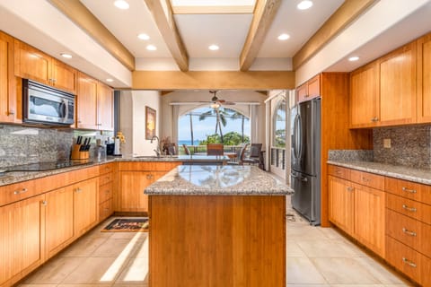 View through the kitchen to the ocean. Stare at the ocean while kitchen.