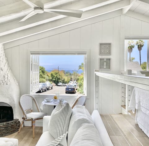 Beach Living! Ocean view & breezes through the large French windows