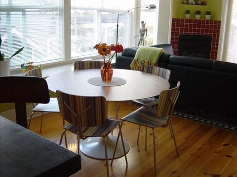 Kitchen table seats six  and wall length bay window