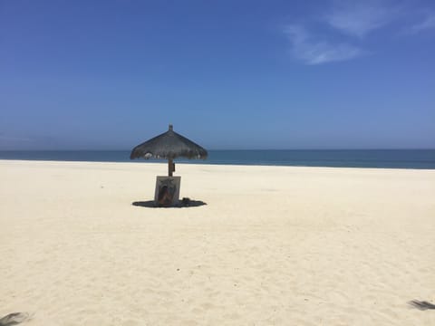 On the beach, sun loungers, beach towels