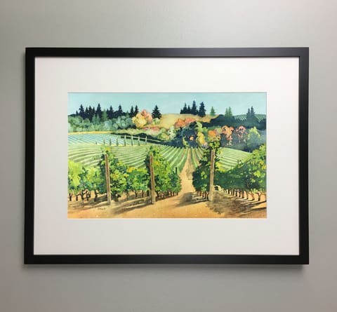 The home is decorated with watercolor paintings of local vineyards.