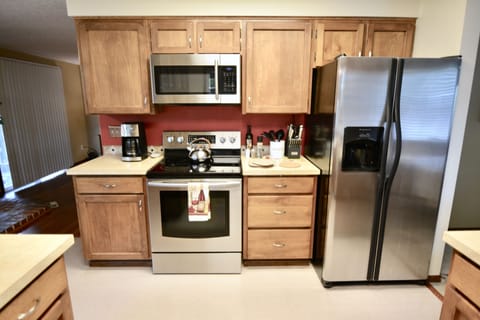 Good sized kitchen with plenty of counter space and stainless steel appliances.