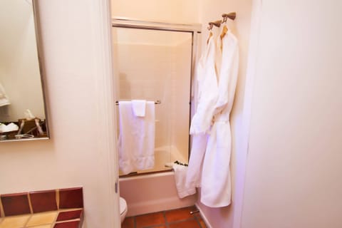 Combined shower/tub, hair dryer, towels, soap