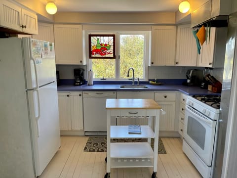 Fridge, microwave, dishwasher, dining tables