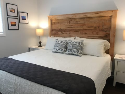 Second bedroom with king memory foam mattress. Custom maple wood headboard.