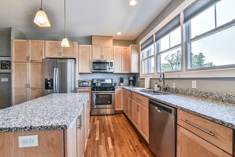 Kitchen is fully equipped and features a gas range!