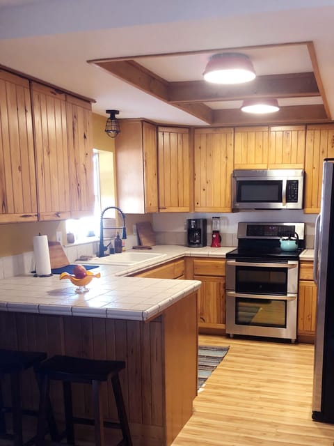 kitchen: coffee maker, blender,  cast iron, dishwasher, microwave