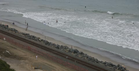 On the beach, sun loungers, beach towels