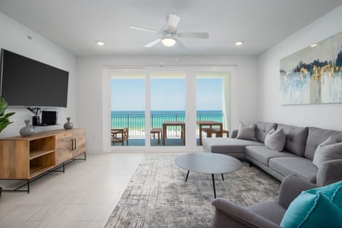Large living area features gulf view and large flat-screen tv