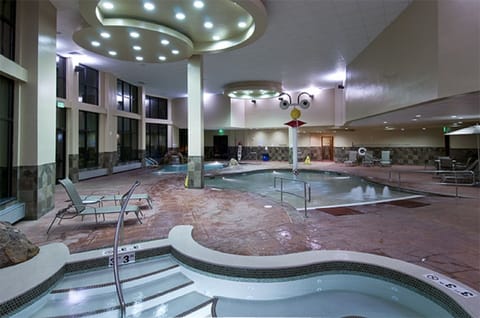 Heated indoor/outdoor pool and one of the several hot tubs