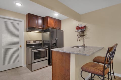Kitchenette with full size appliances.
