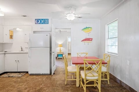Bunk room/bathroom with laundry entrance.