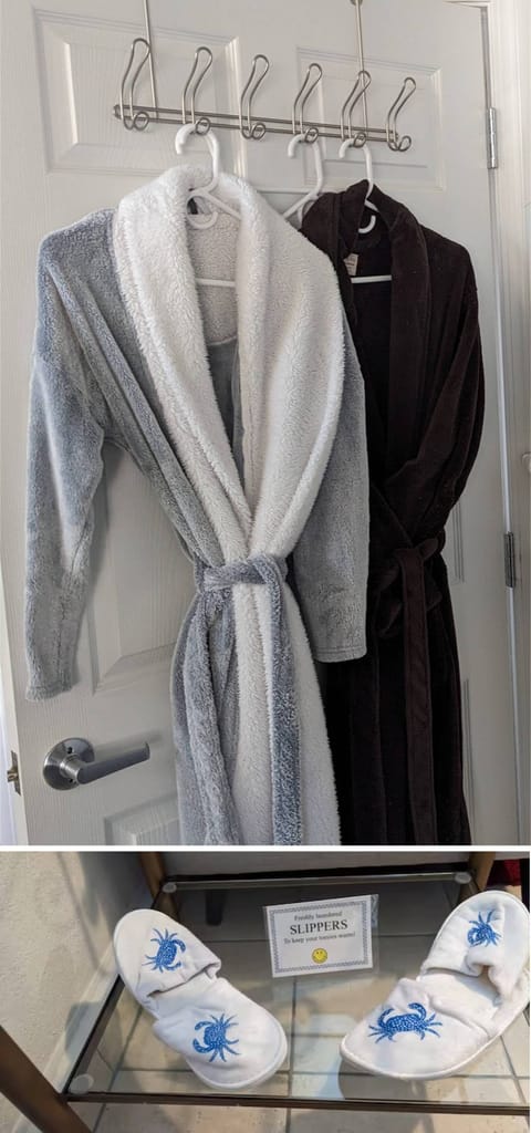 Shower, hair dryer, slippers, towels