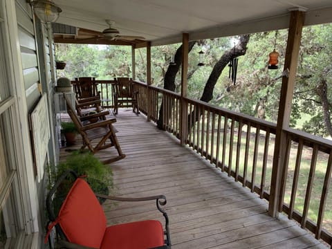 Rock away a quiet country moment on the shaded porch. Birds and wildlife love to stroll right up to the Homestead.