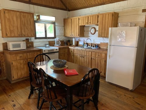 Fully equipped eat in kitchen.