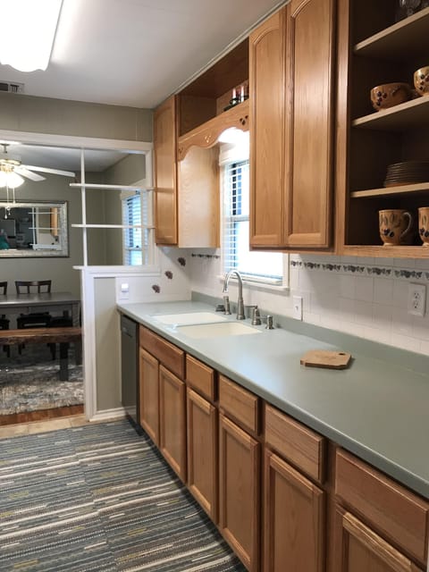 Sink is across from range with view of wester pasture.  Plenty of counterspace