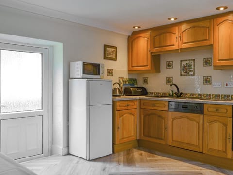 Well equipped kitchen area | Lorna’s At The Grange - Grange Country House Holiday Cottages, Loweswater, near Cockermouth